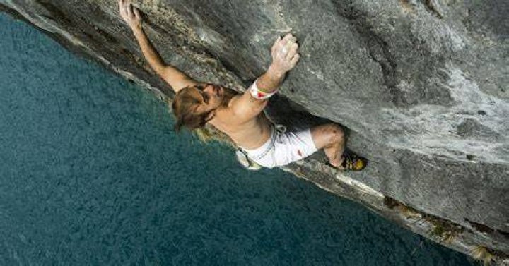 What is soloing in climbing?